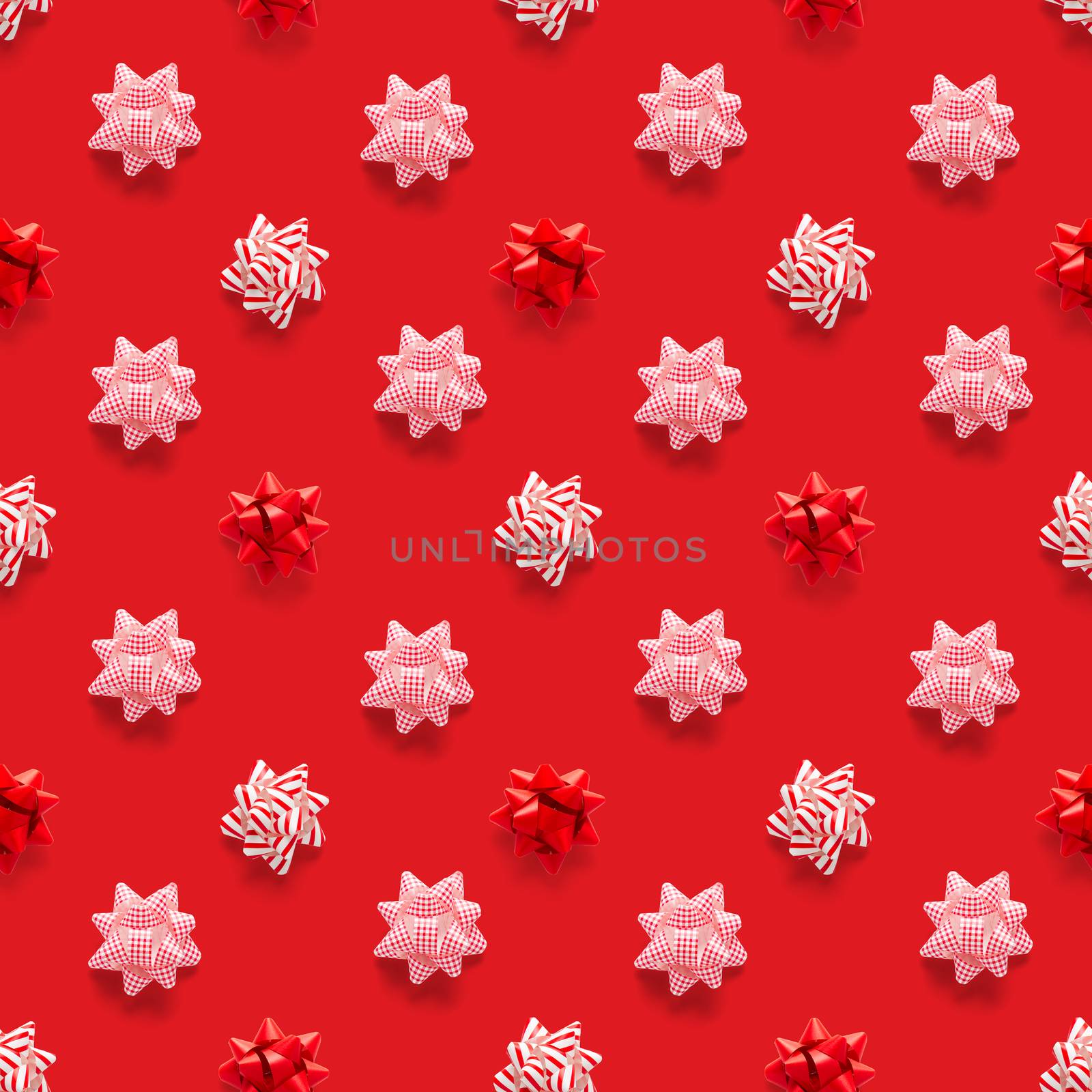 Seamless regular creative Christmas pattern with New Year decorations on red background. xmas Modern Seamless pattern made from christmas decorations. Photo quality pattern for fabric, prints, wallpapers, banners or creative design works.