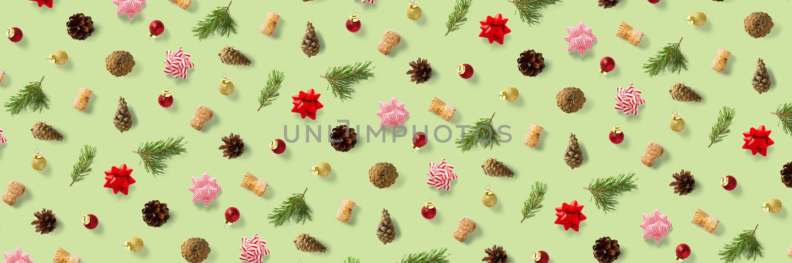 modern christmas background on green backdrop. creative flat lay for christmas time, banners, posters, prints and other creative works. by PhotoTime