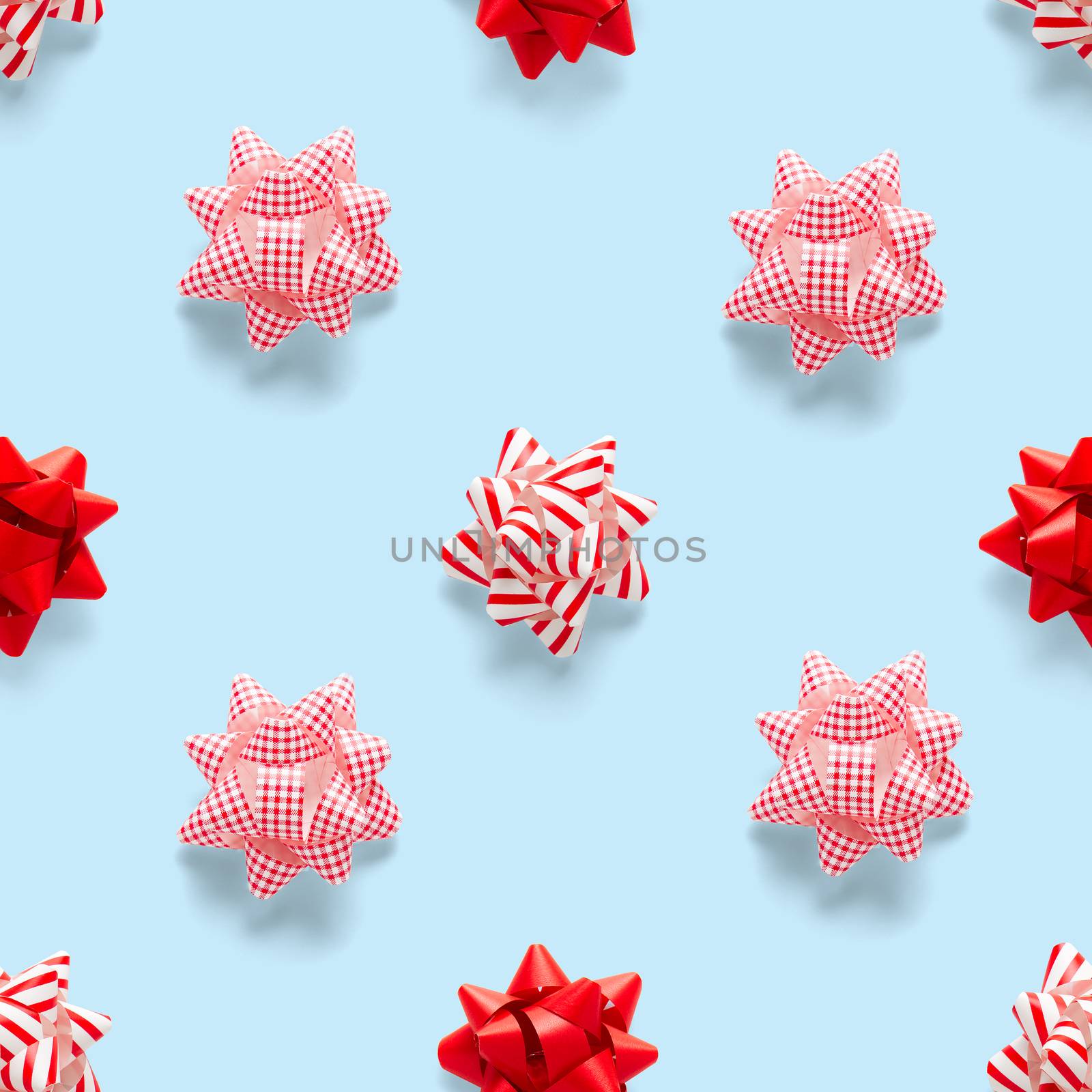 Seamless regular creative Christmas pattern with New Year decorations on blue background. xmas Modern Seamless pattern made from christmas decorations. Photo quality pattern for fabric, prints, wallpapers, banners or creative design works.