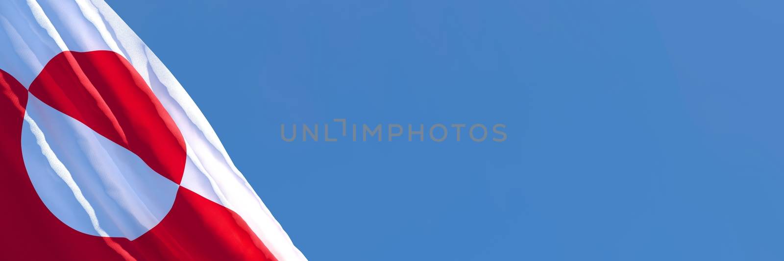 3D rendering of the national flag of Greenland waving in the wind against a blue sky