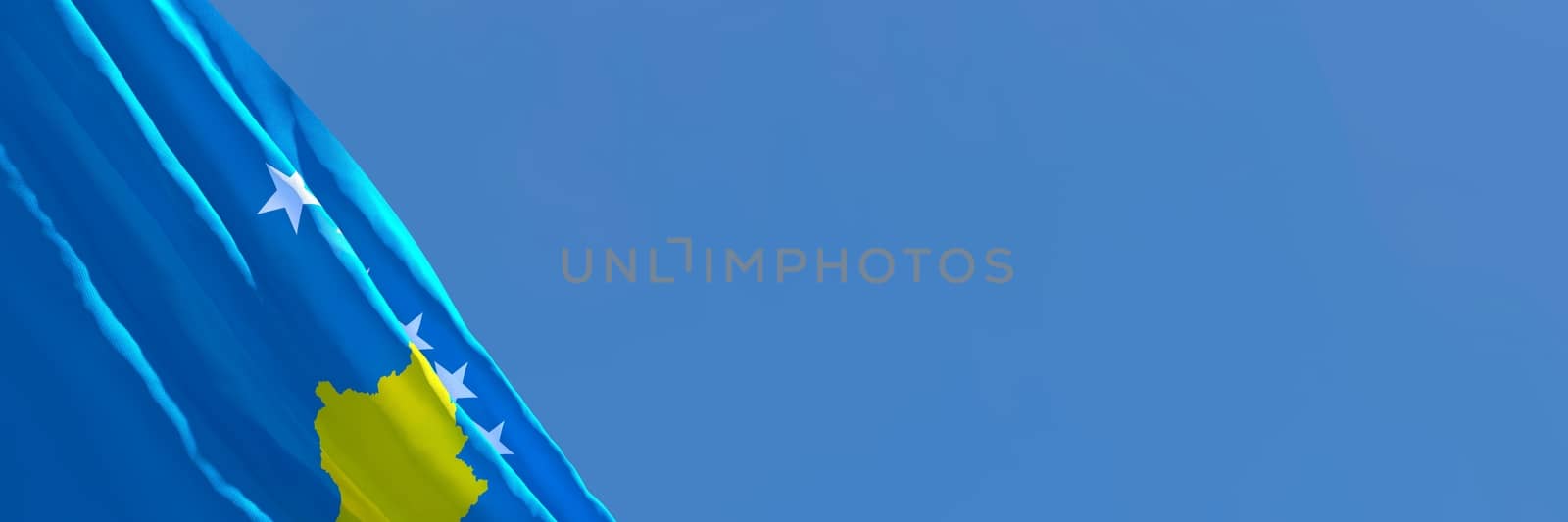 3D rendering of the national flag of Kosovo waving in the wind against a blue sky