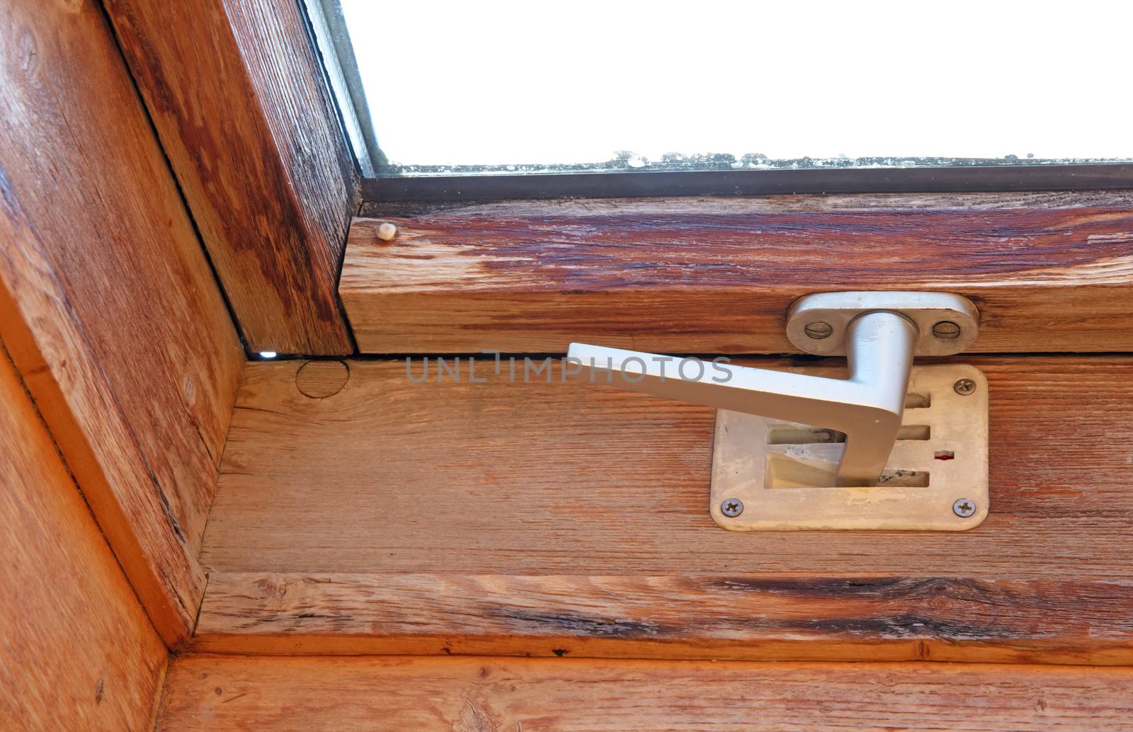 Old window in a roof, in need of some maintenance