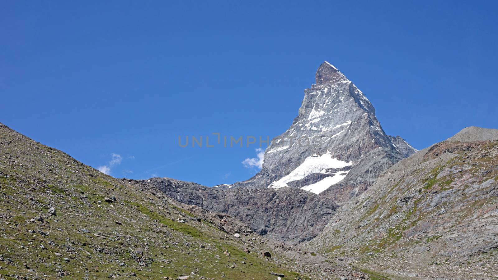 The Matterhorn, the iconic emblem of the Swiss Alps, summertime