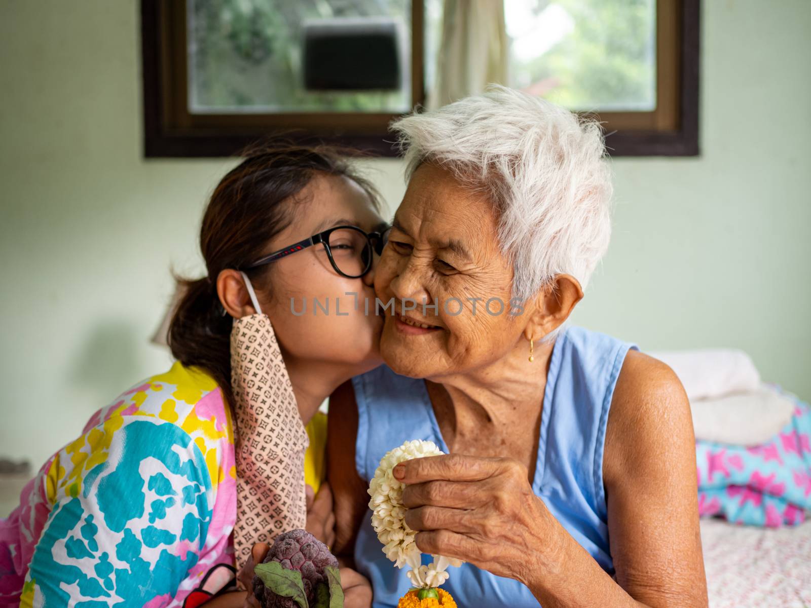 chachangsao,thailand. 8/12/2020. The image of the woman on the cheek grandmother. real bodies concept. by Unimages2527