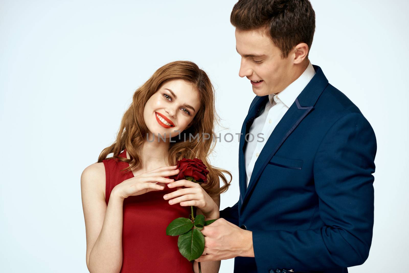 cute man and woman dating relationship red rose lifestyle romance. High quality photo