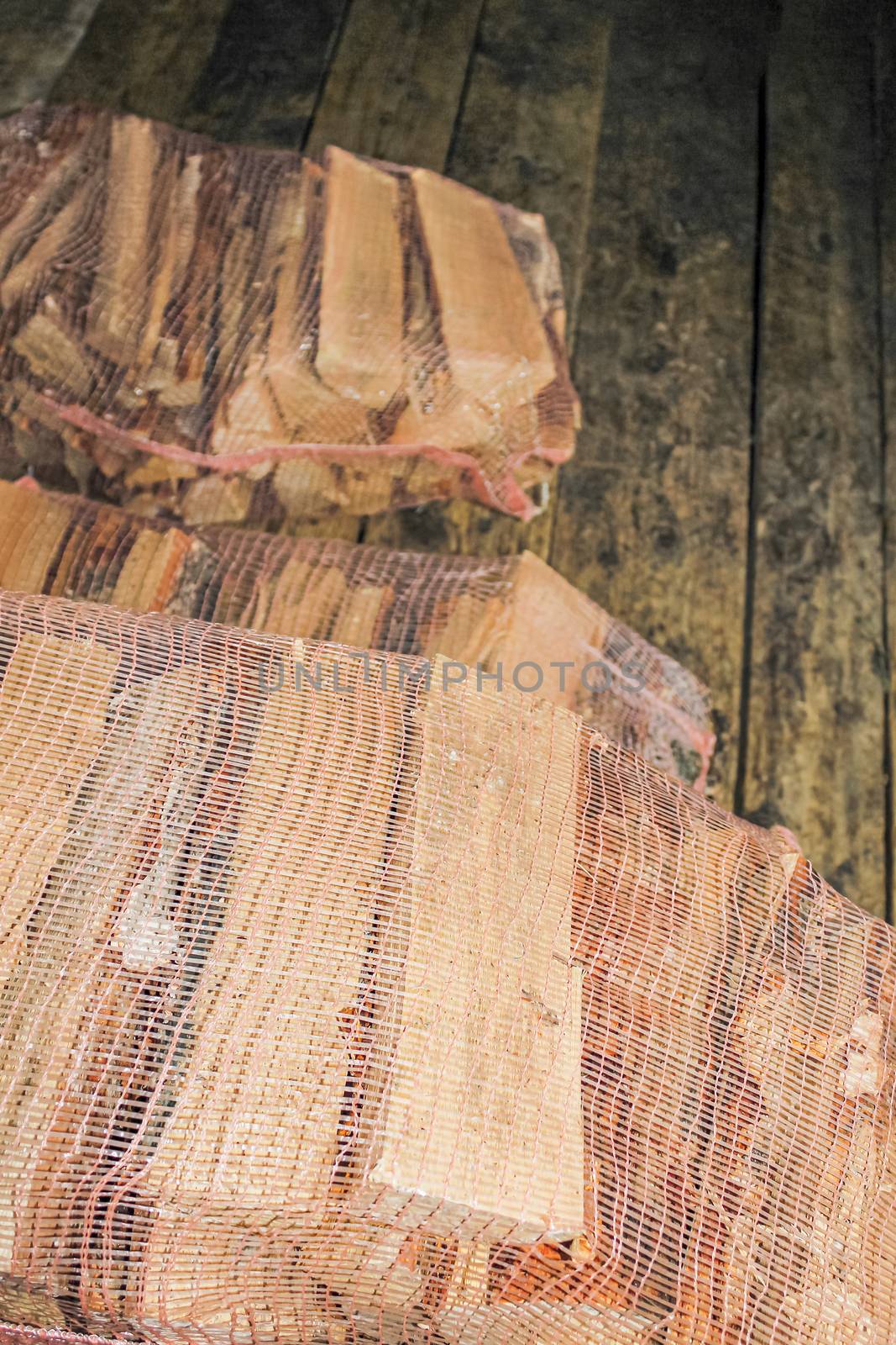 Firewood stored in sacks in a hut in Hemsedal, Norway.