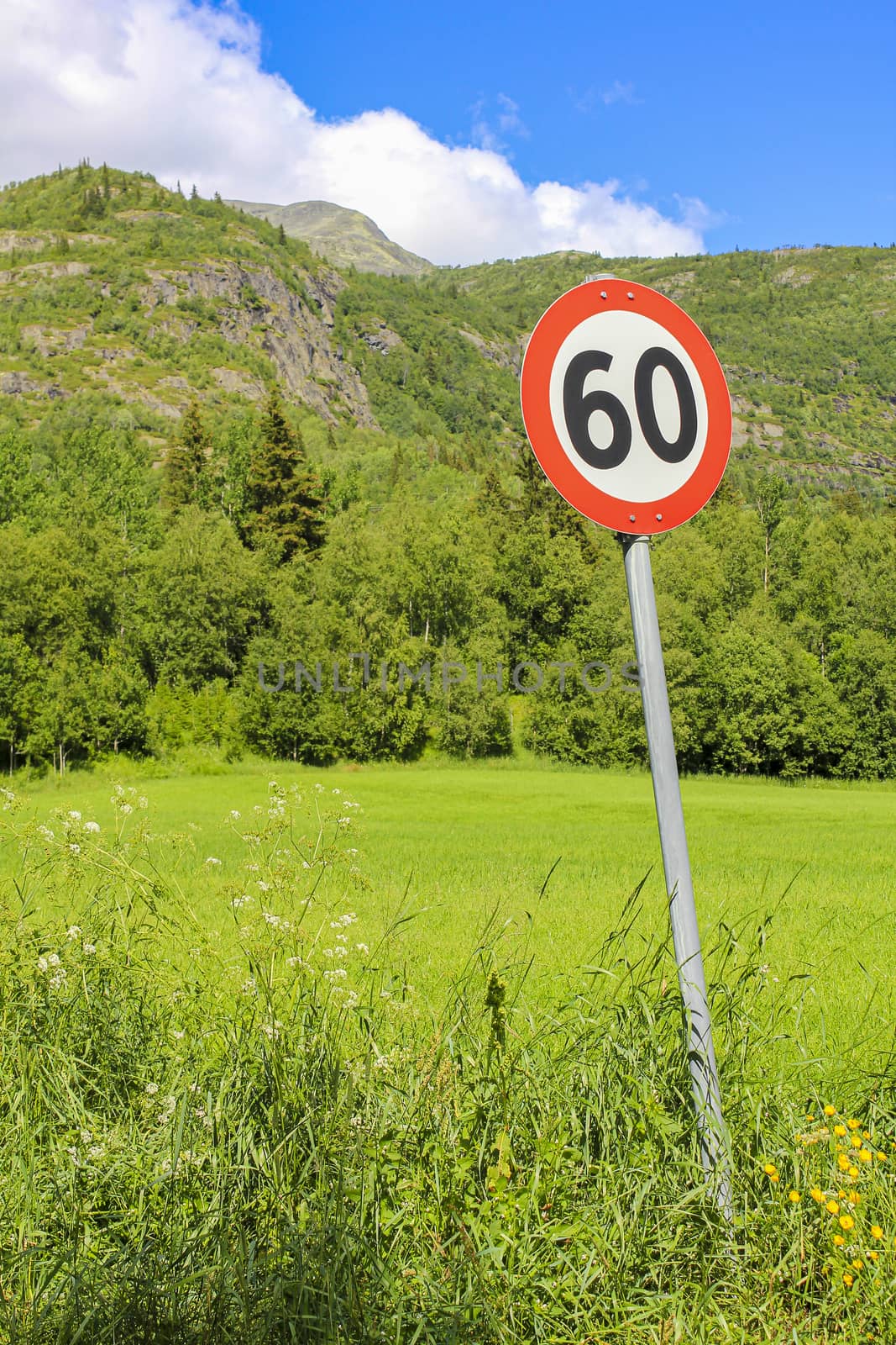 60s zone 60 road sign around red, Norway. by Arkadij