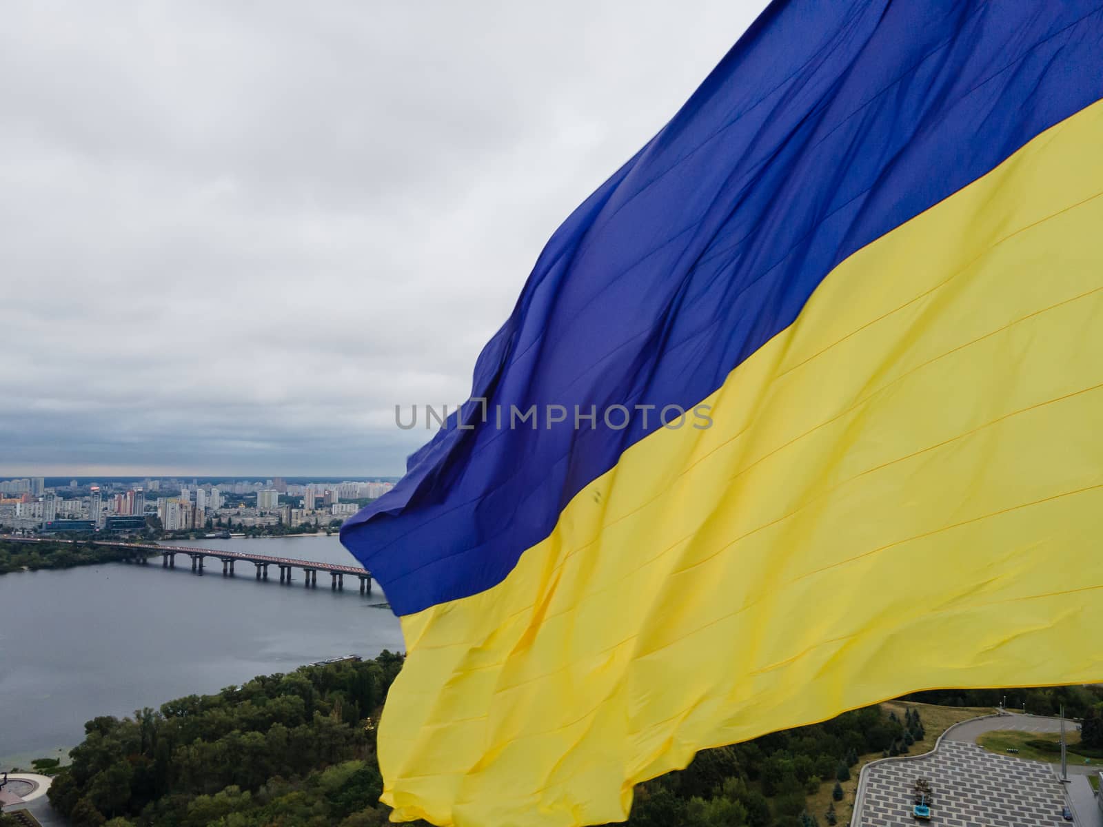 Kyiv - National flag of Ukraine by day. Aerial. Kiev