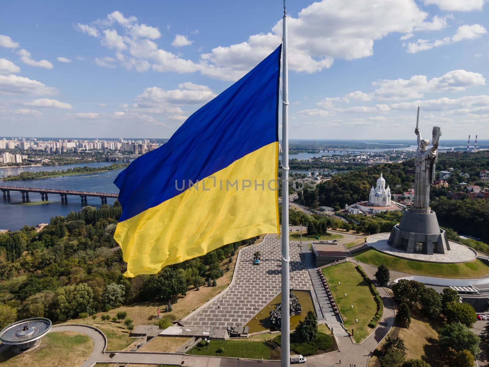 Kyiv - National flag of Ukraine by day. Aerial. Kiev