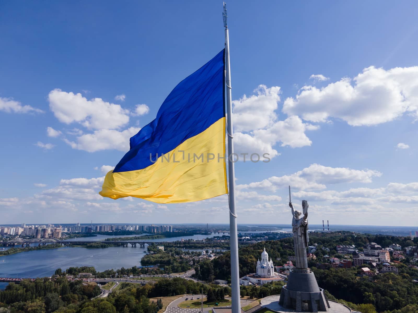 Kyiv - National flag of Ukraine by day. Aerial. Kiev