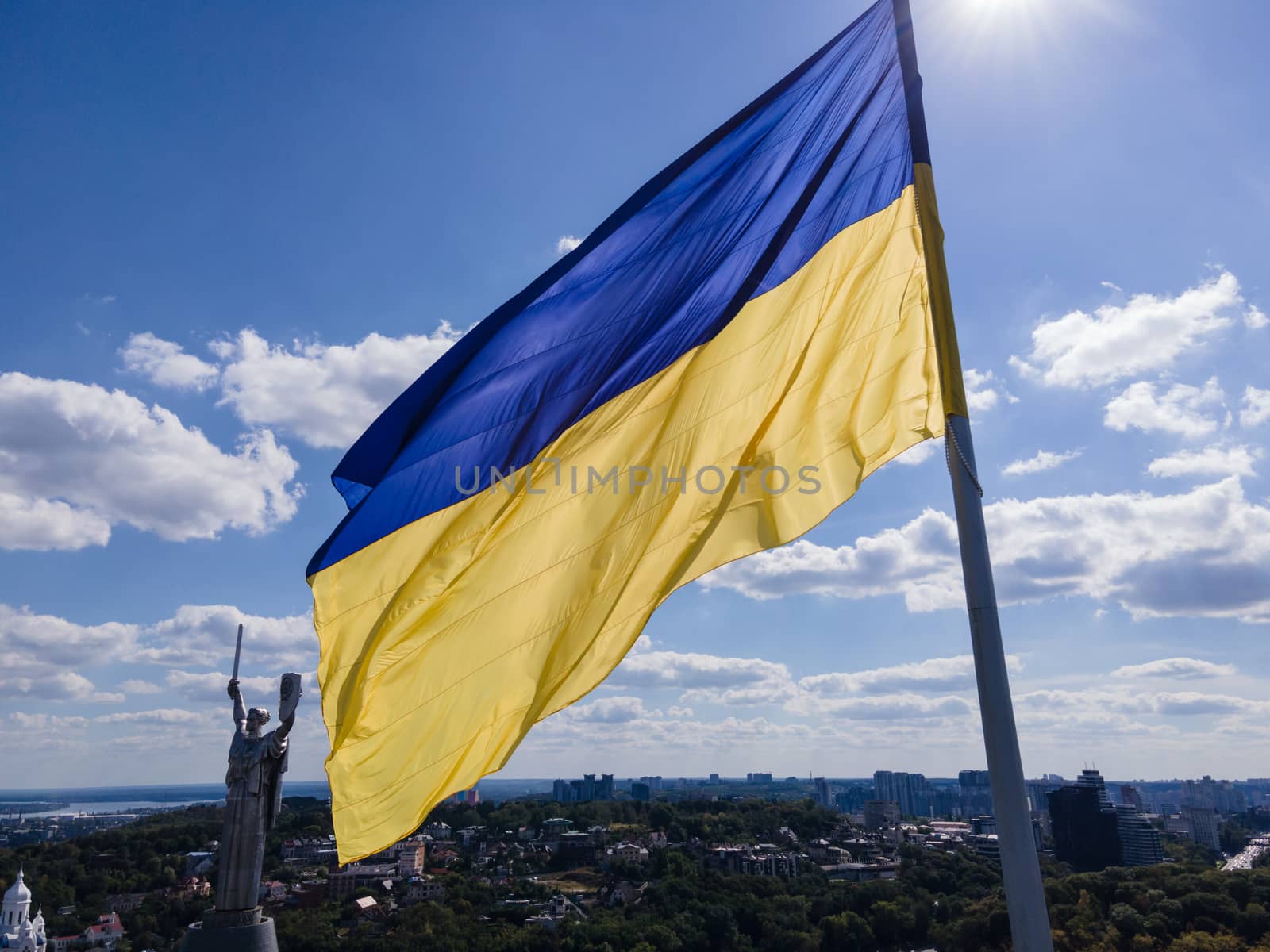 Kyiv - National flag of Ukraine by day. Aerial. Kiev