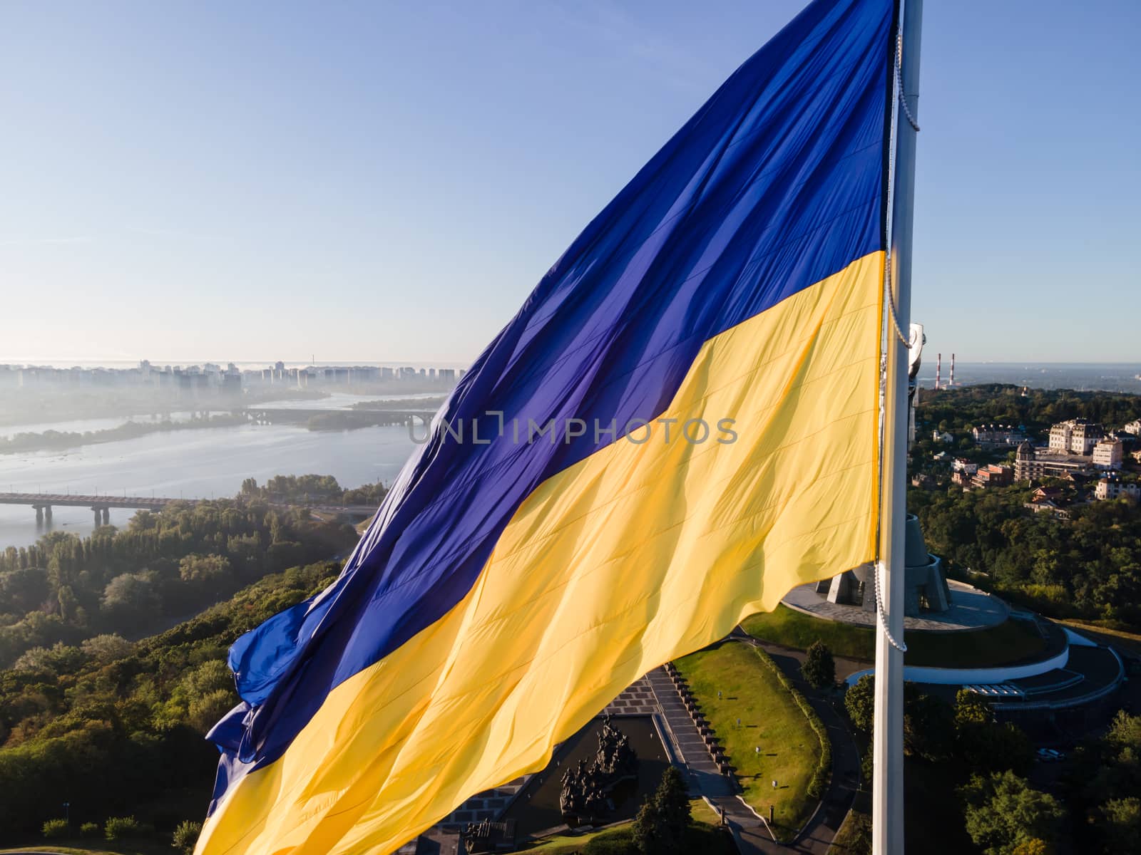 Kyiv - National flag of Ukraine by day. Aerial. Kiev