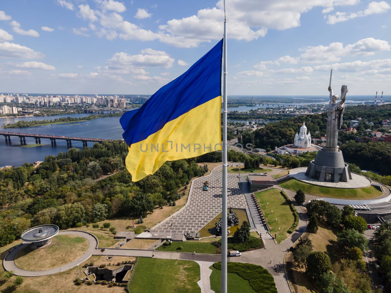 Kyiv - National flag of Ukraine by day. Aerial. Kiev