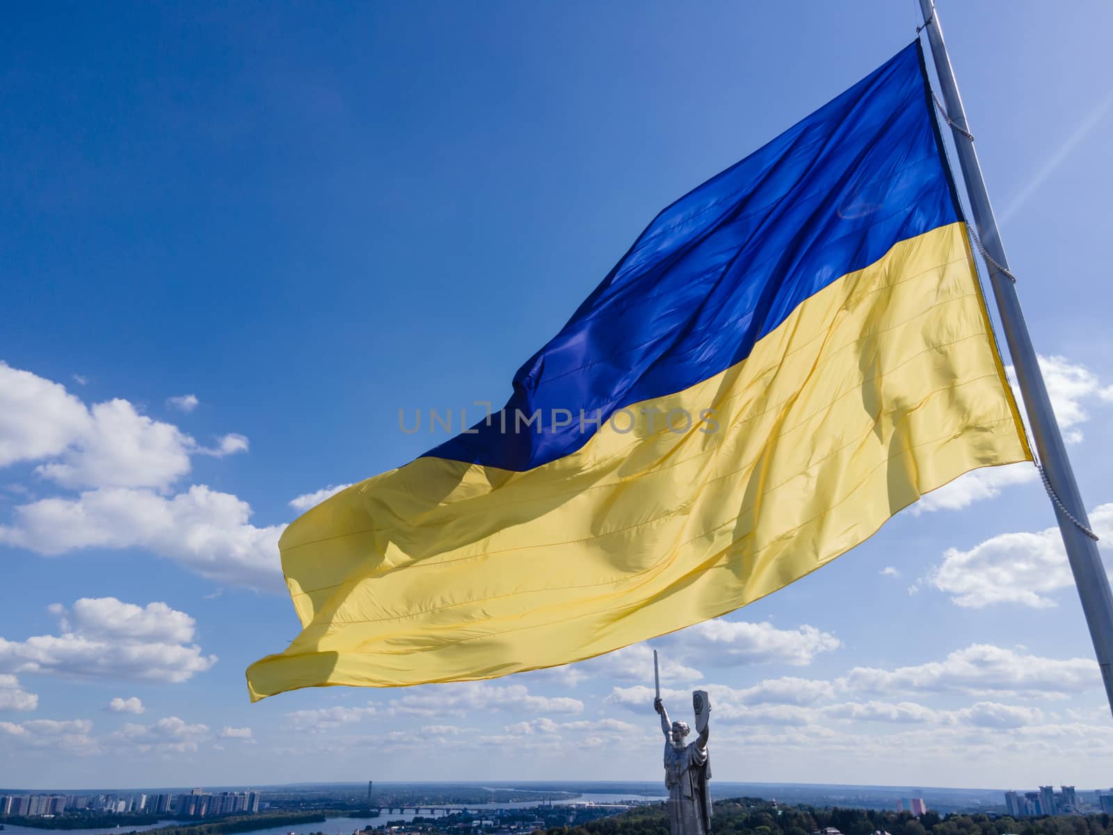 Kyiv - National flag of Ukraine by day. Aerial. Kiev