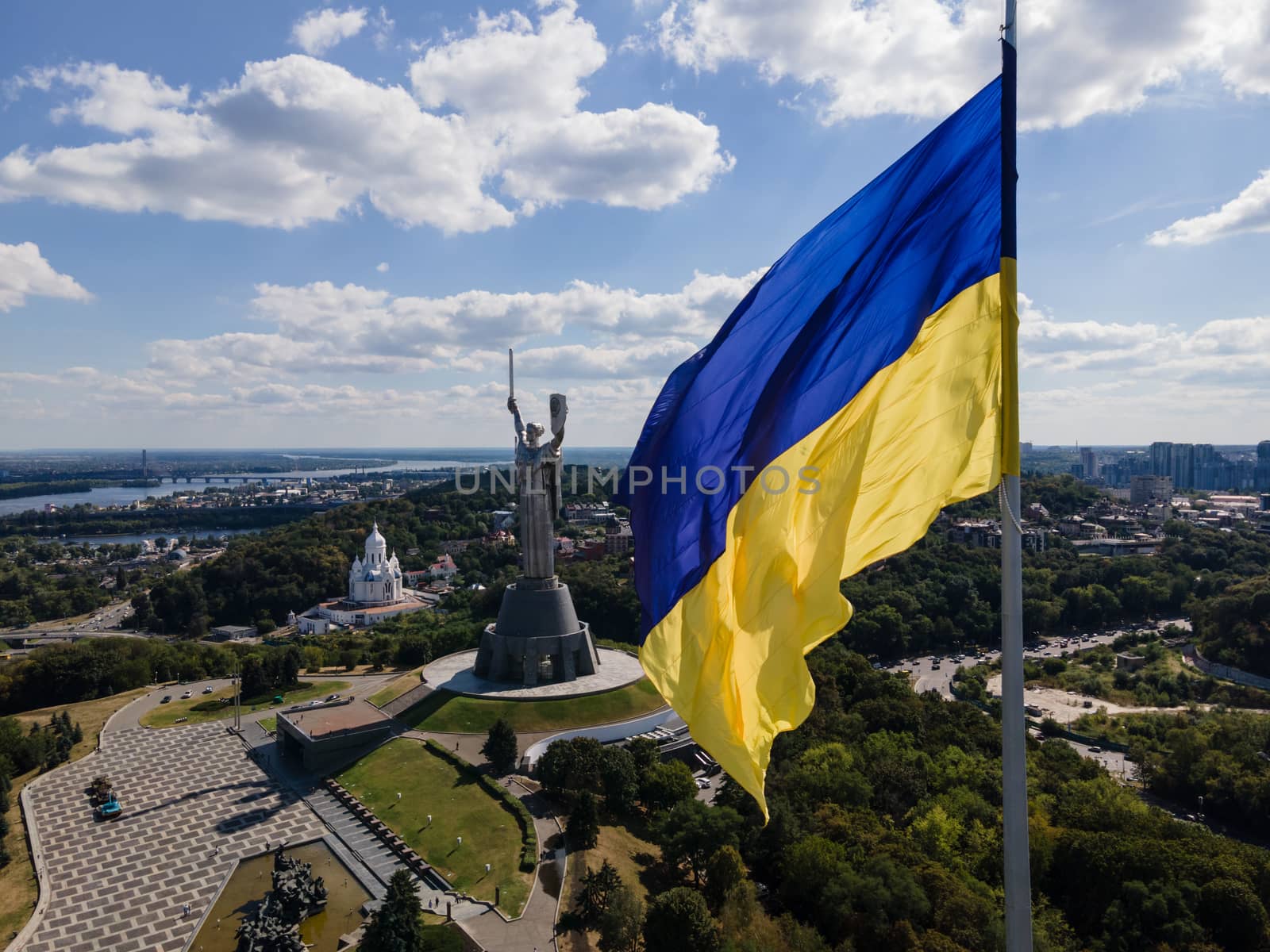 Kyiv - National flag of Ukraine by day. Aerial. Kiev