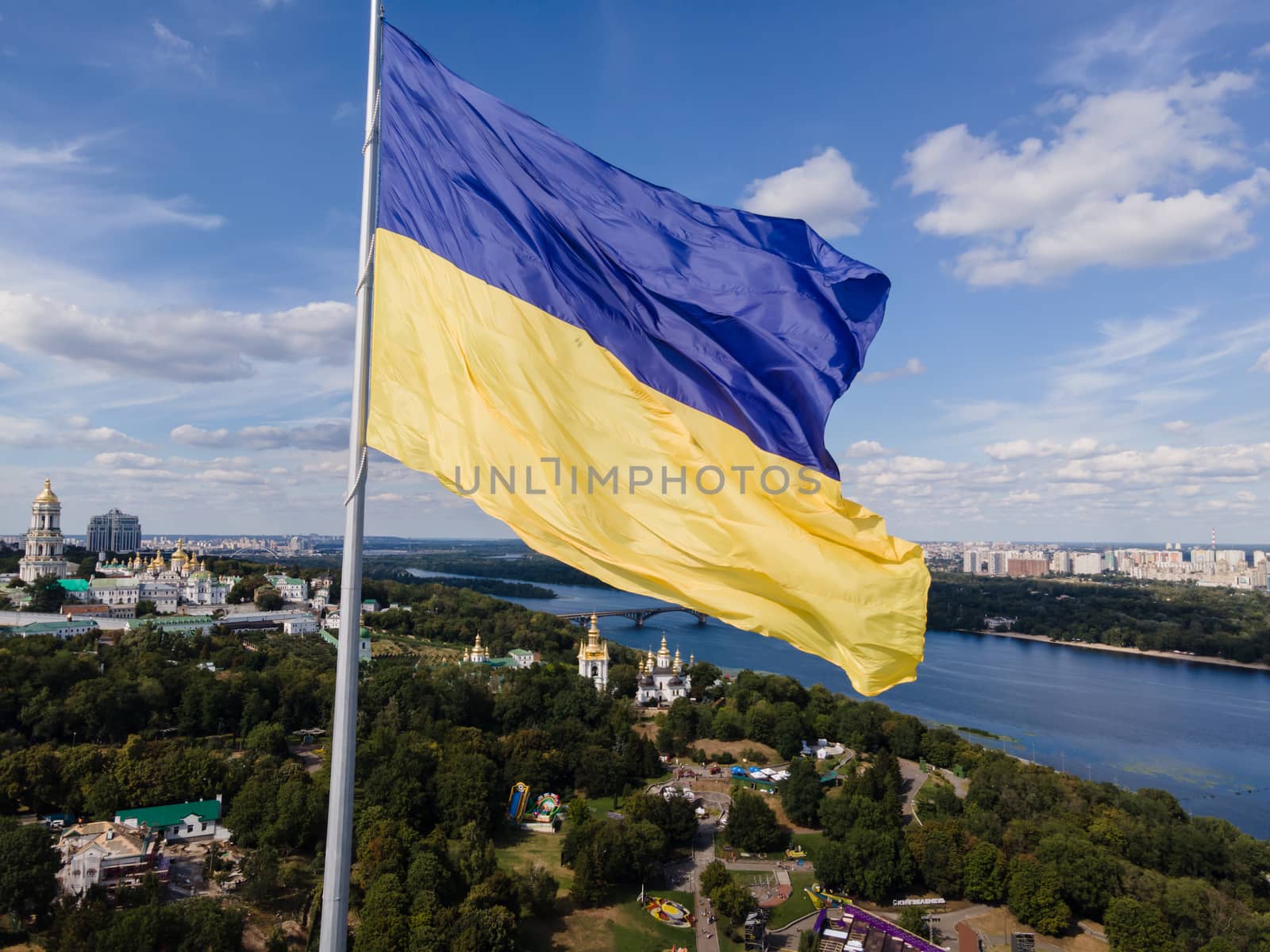 Kyiv - National flag of Ukraine by day. Aerial. Kiev