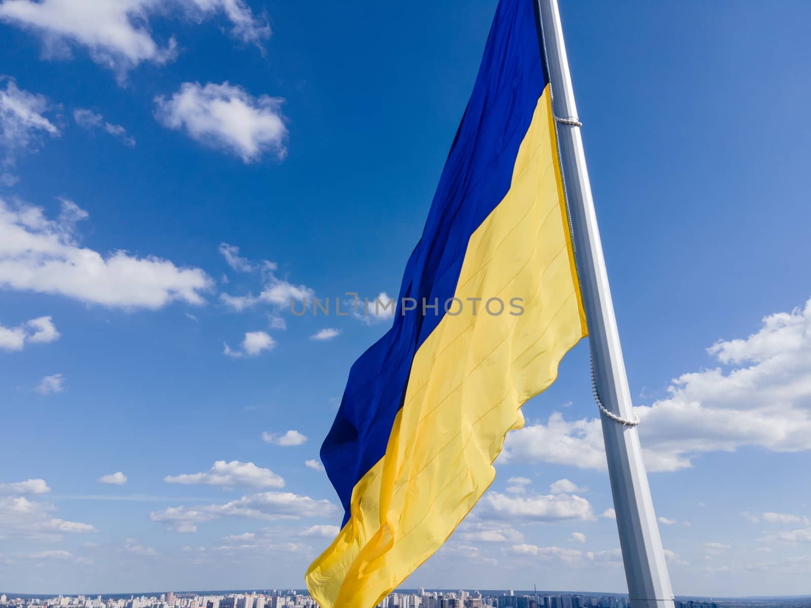 Kyiv - National flag of Ukraine by day. Aerial. Kiev