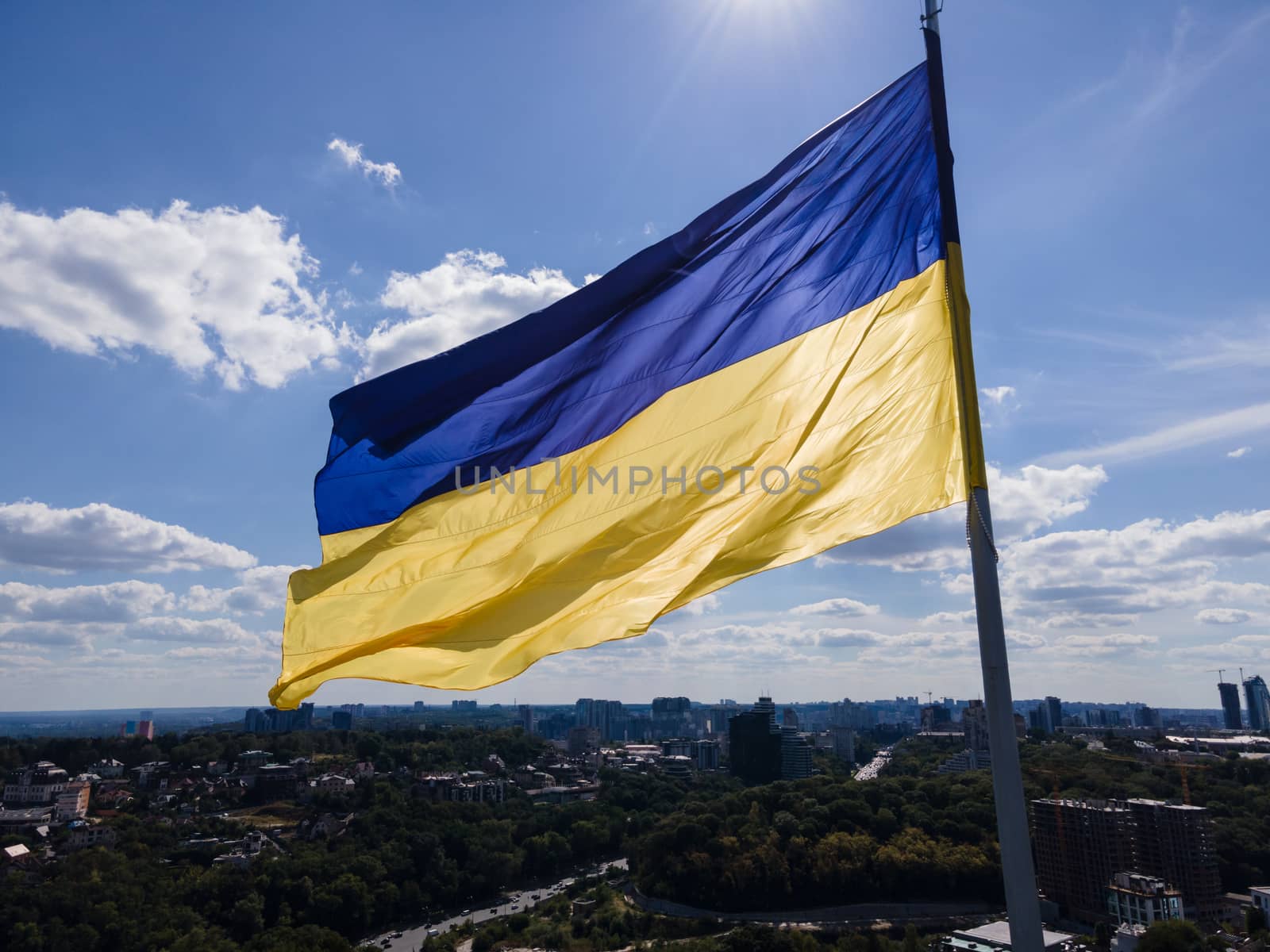 Kyiv - National flag of Ukraine by day. Aerial. Kiev