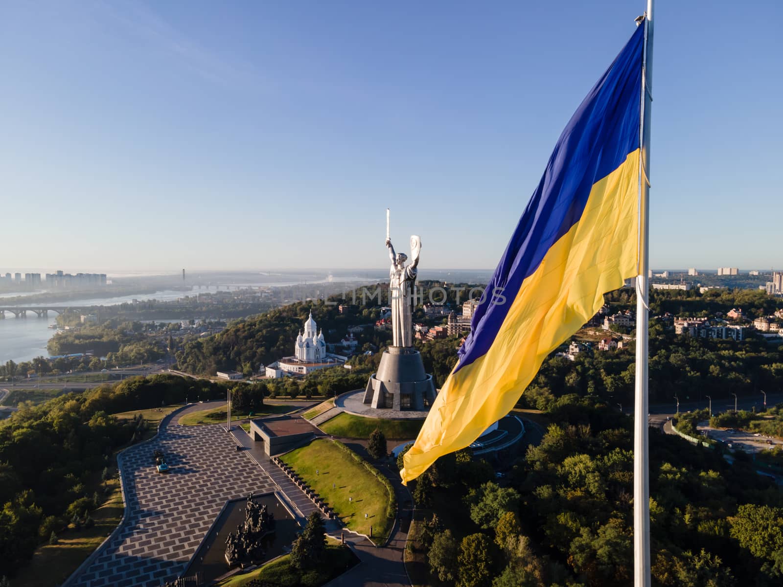 Kyiv - National flag of Ukraine by day. Aerial. Kiev