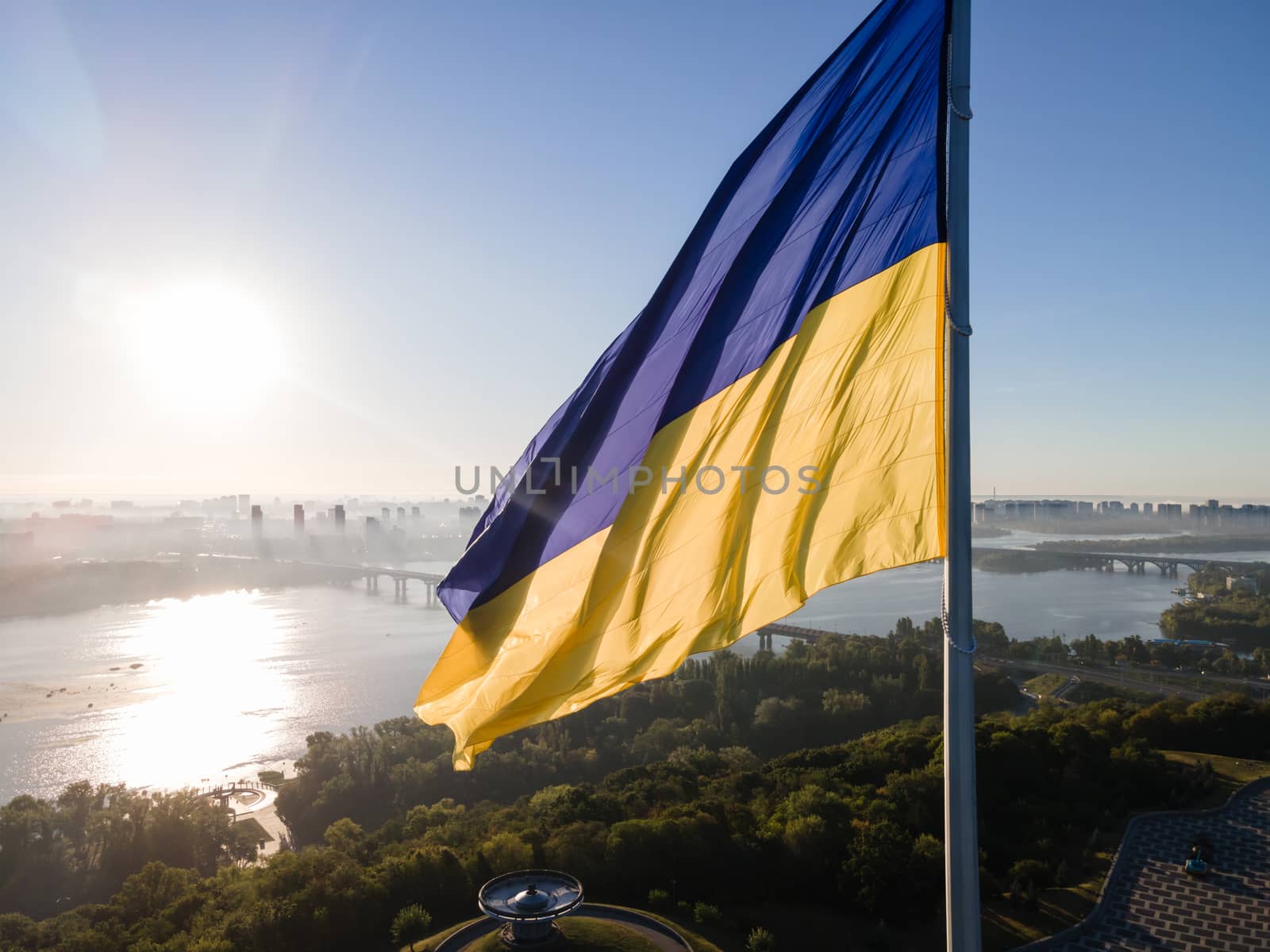 Kyiv - National flag of Ukraine by day. Aerial. Kiev