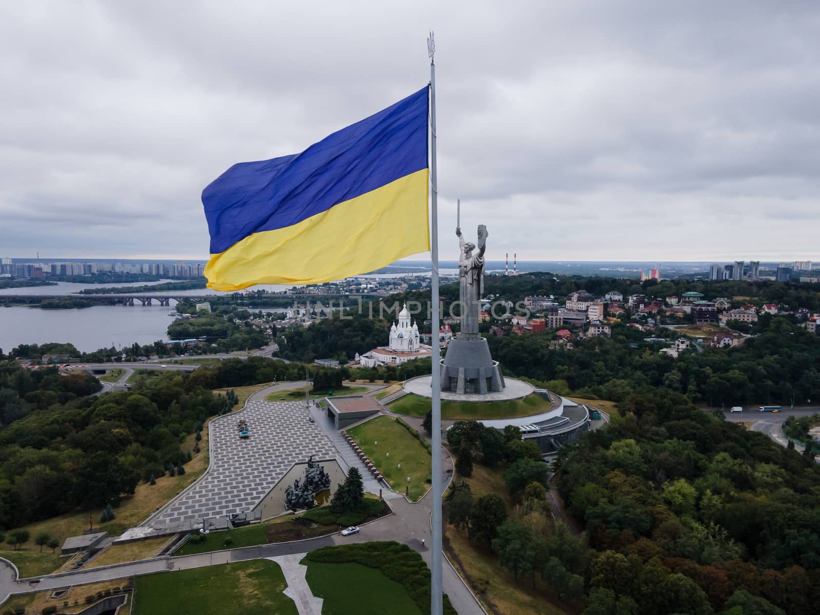 Kyiv - National flag of Ukraine by day. Aerial. Kiev