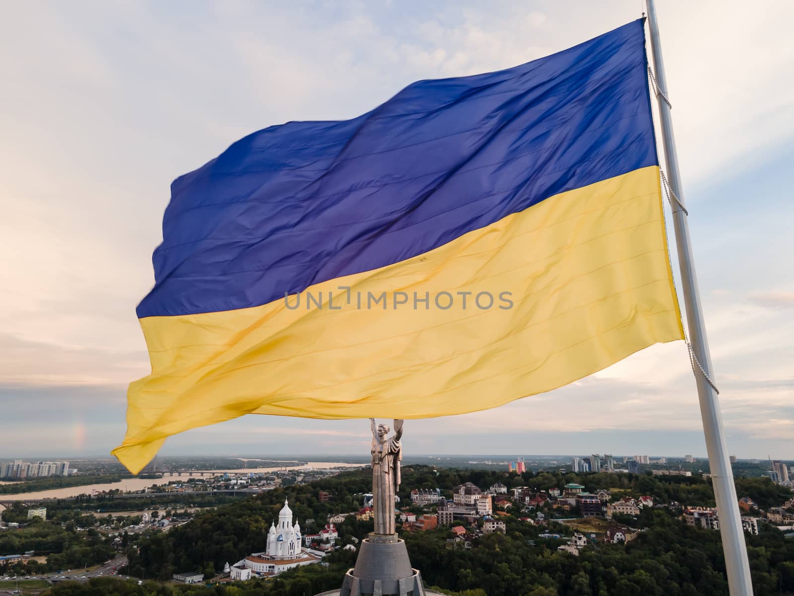 Kyiv - National flag of Ukraine by day. Aerial. Kiev