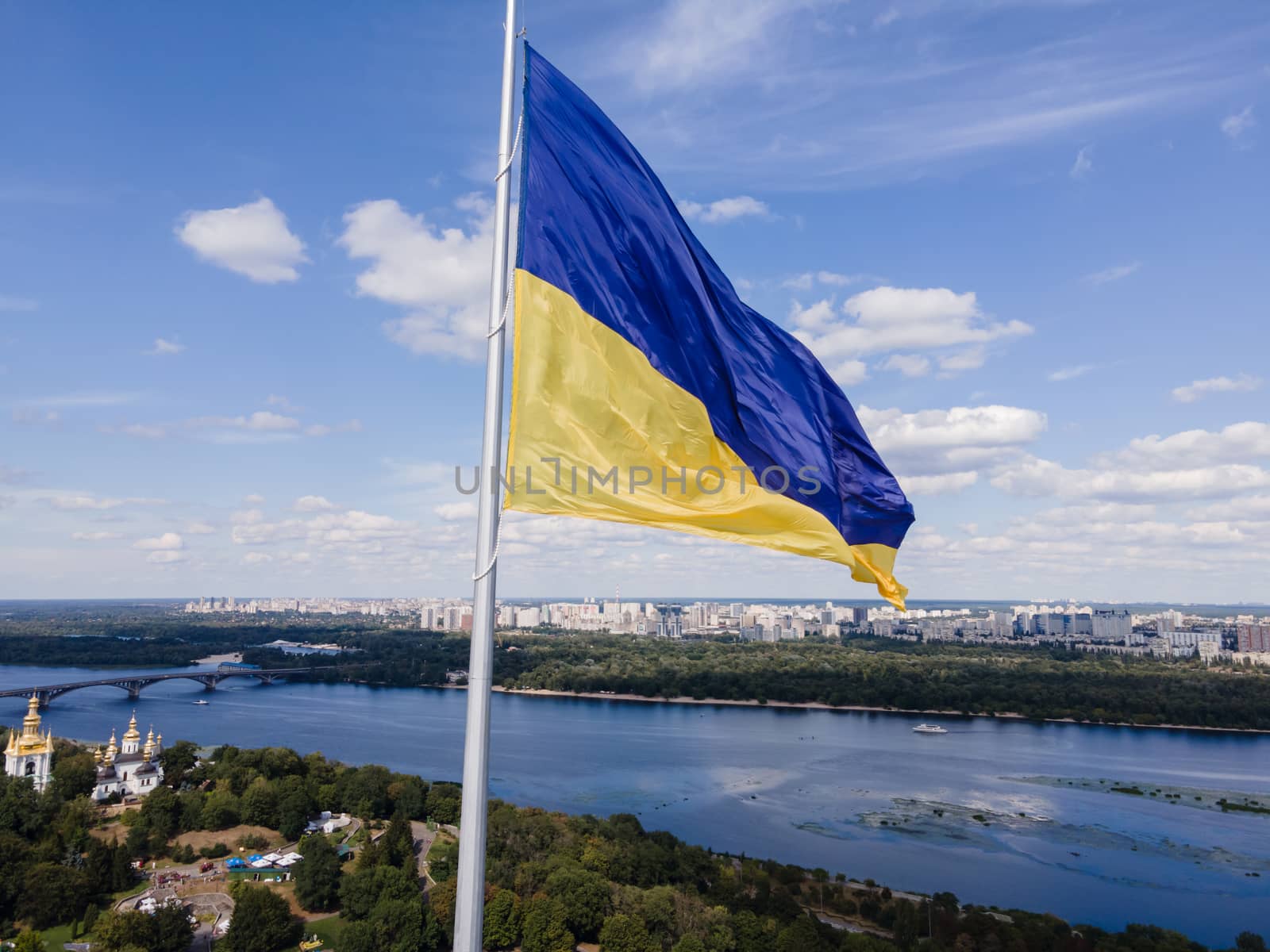 Kyiv - National flag of Ukraine by day. Aerial. Kiev