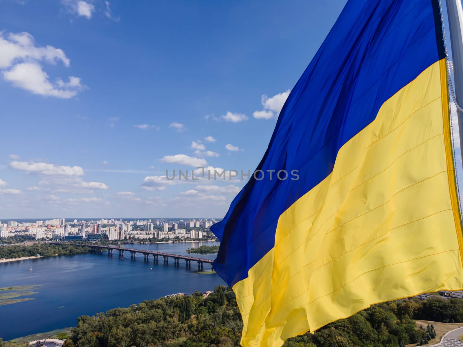 Kyiv - National flag of Ukraine by day. Aerial. Kiev