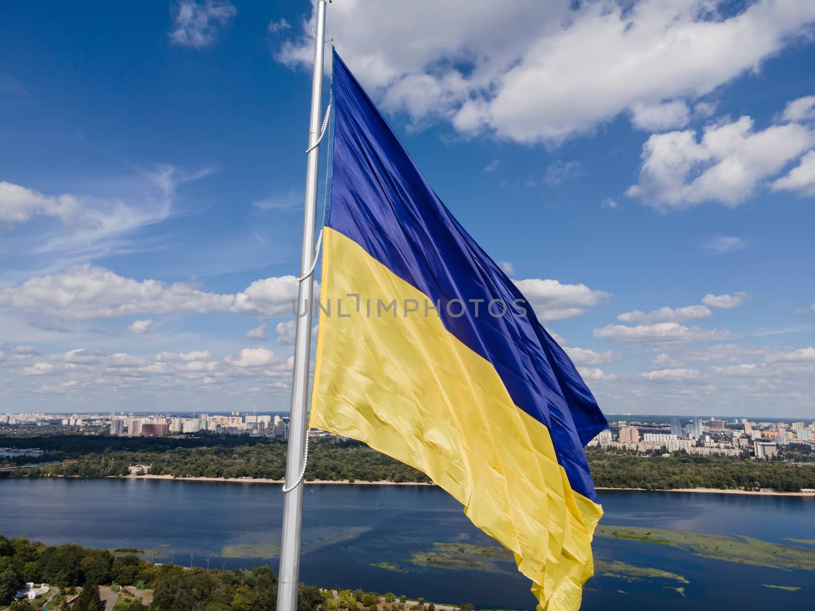 Kyiv - National flag of Ukraine by day. Aerial. Kiev