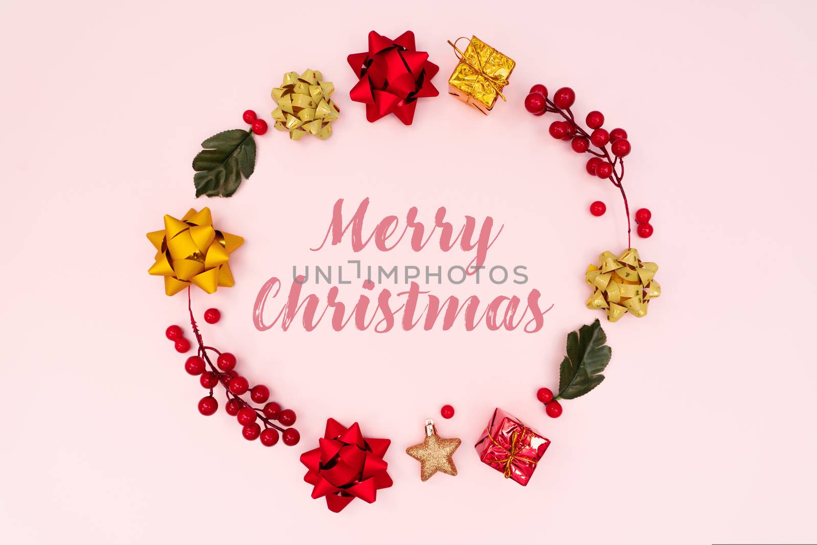 Christmas wreath on pink background. Christmas decoration. Flat lay, top view, copy space