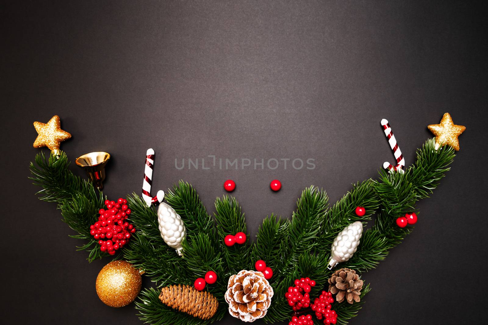 Christmas pine tree with xmas decoration on black background