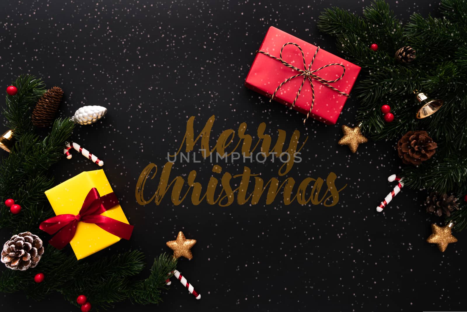 Christmas gift box and pine tree with xmas decoration on black background