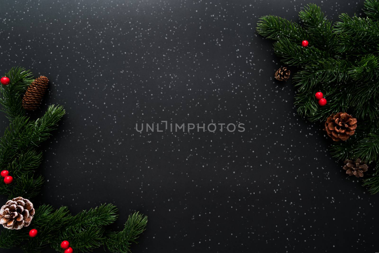 Christmas pine tree with xmas decoration on black background