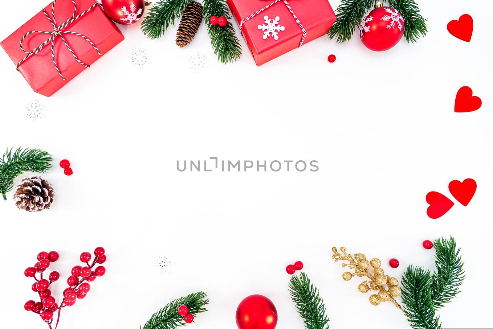 Christmas composition. Christmas ball, pine cones, fir branches on white background. Flat lay, top view, copy space