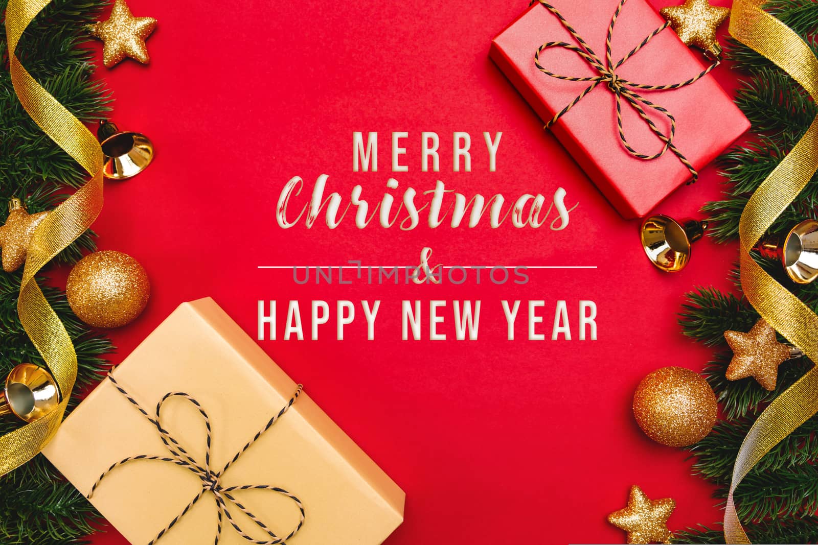 Christmas present and pine tree with xmas decoration on Red background