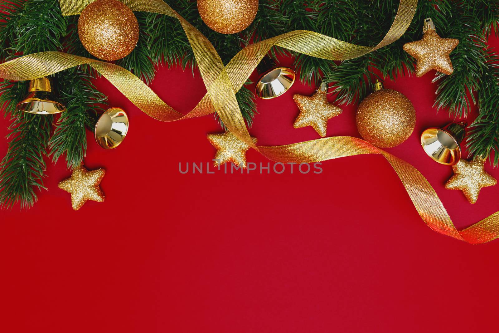 Christmas pine tree with xmas decoration on Red background