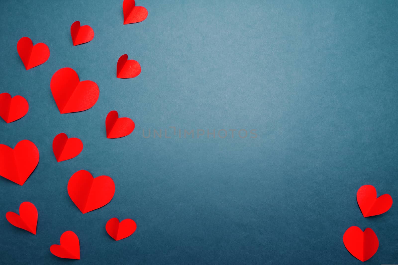 Valentine card with red heart on blue background, abstract, flat lay, top view