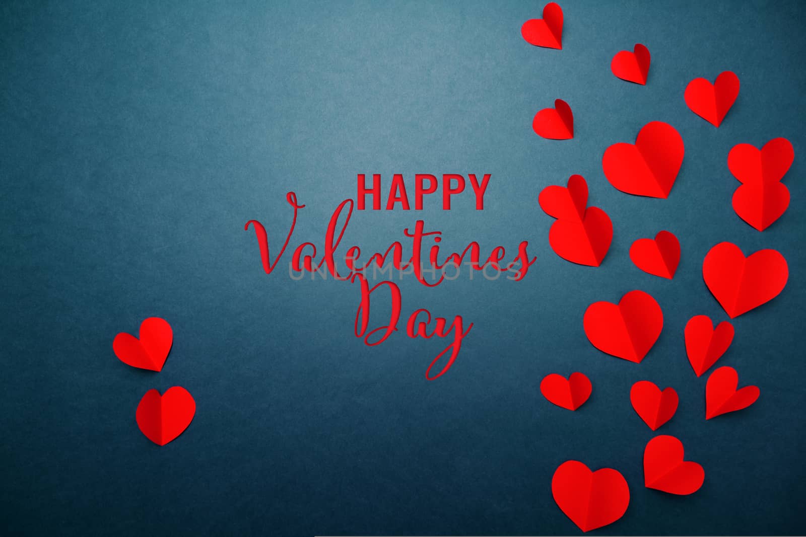 Valentine card with red heart on blue background, abstract, flat lay, top view