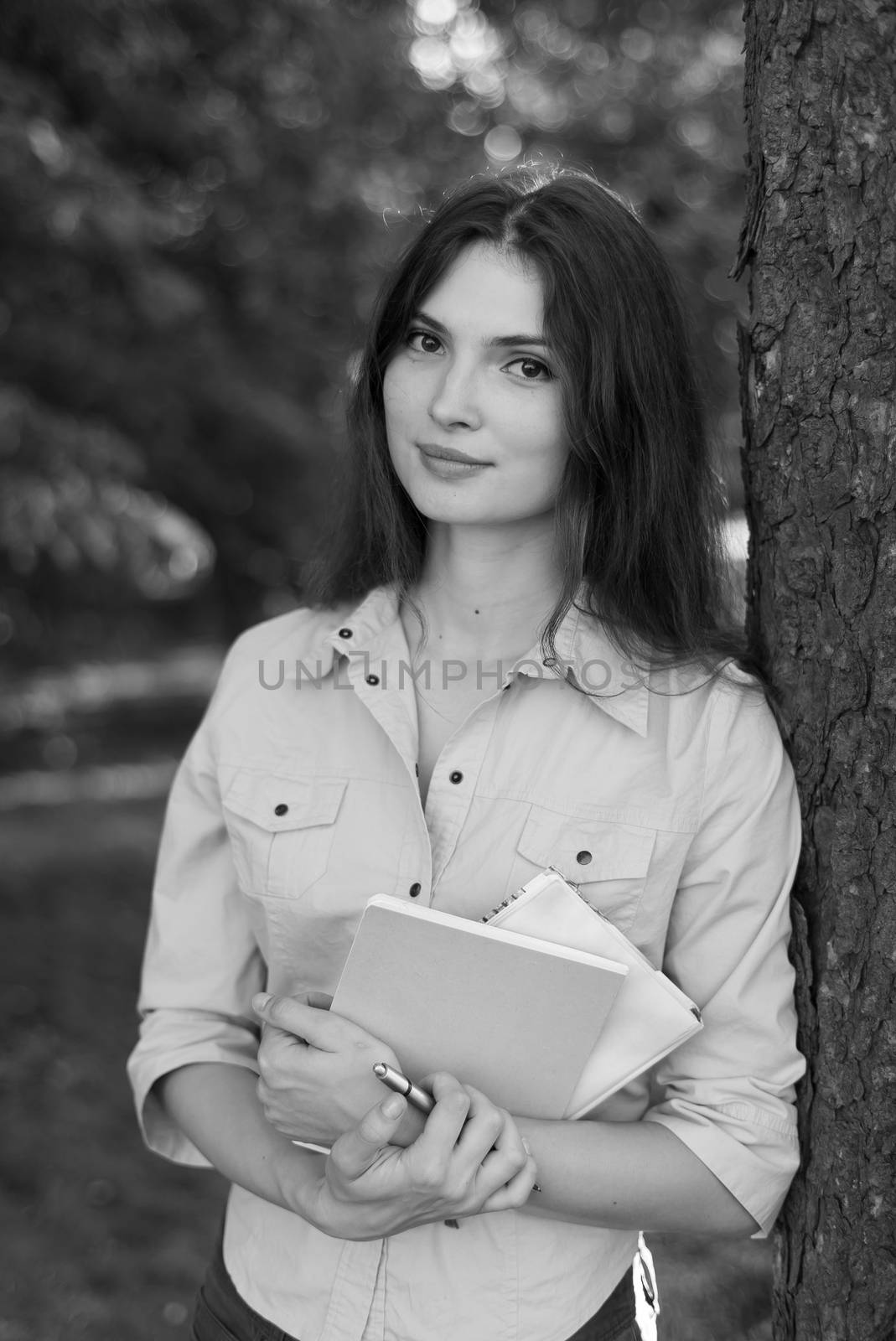 Young beautiful girl student in shirt. Black and white photo. BW by Mykola_Kondrashev