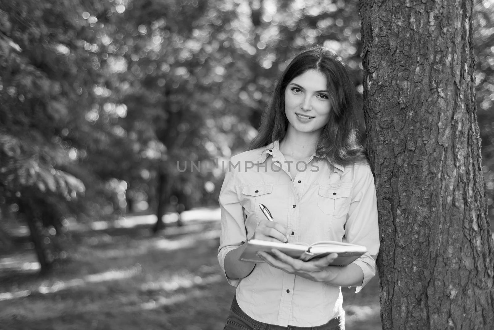 Young beautiful girl student in shirt. Black and white photo. BW by Mykola_Kondrashev