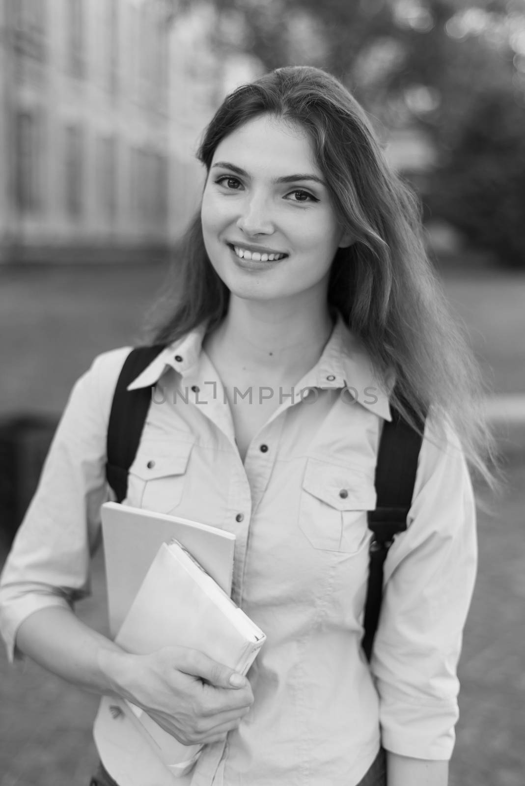 Young beautiful girl student in shirt. Black and white photo. BW by Mykola_Kondrashev