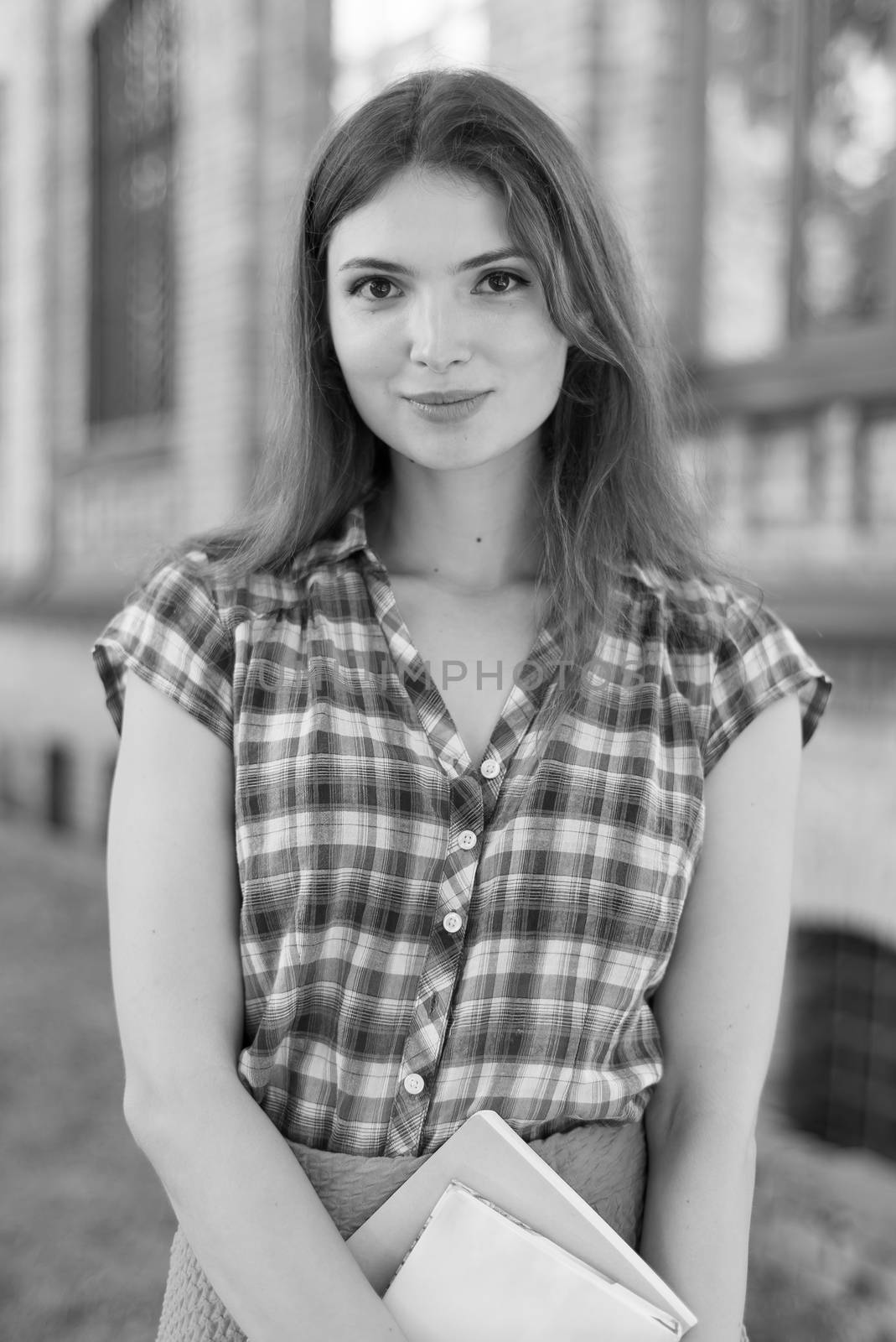 Girl student in skirt and plaid shirt. Black and white photo. BW by Mykola_Kondrashev