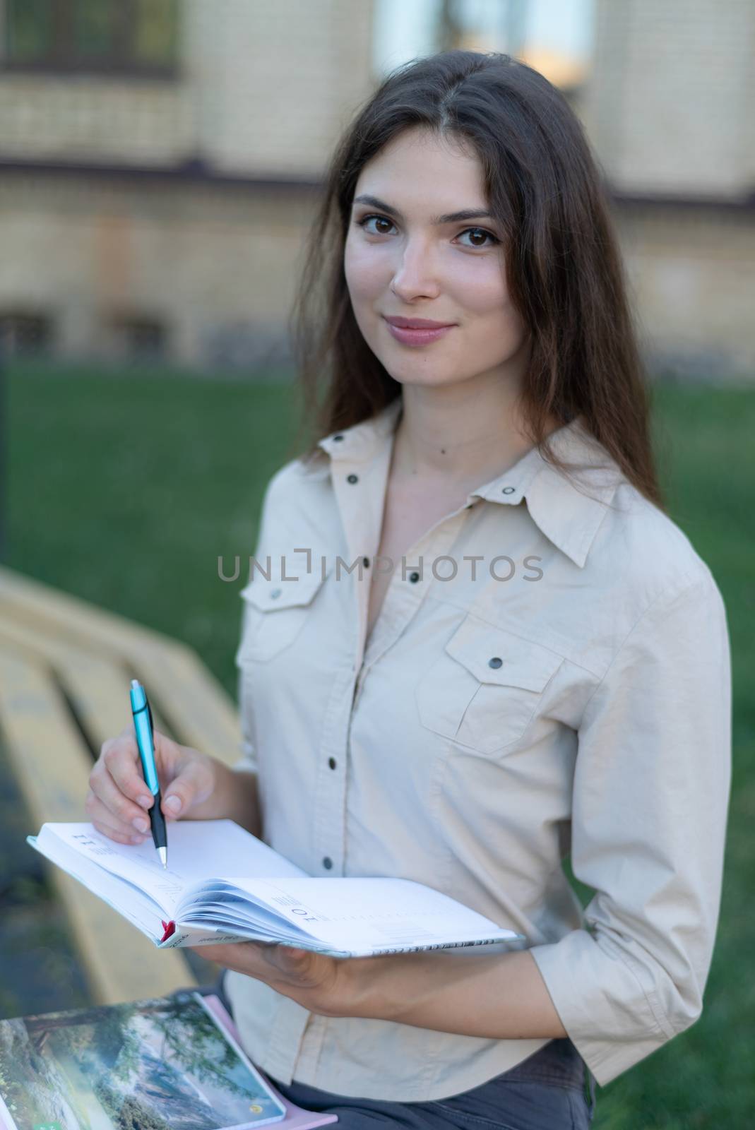 Young beautiful girl student in shirt by day by Mykola_Kondrashev