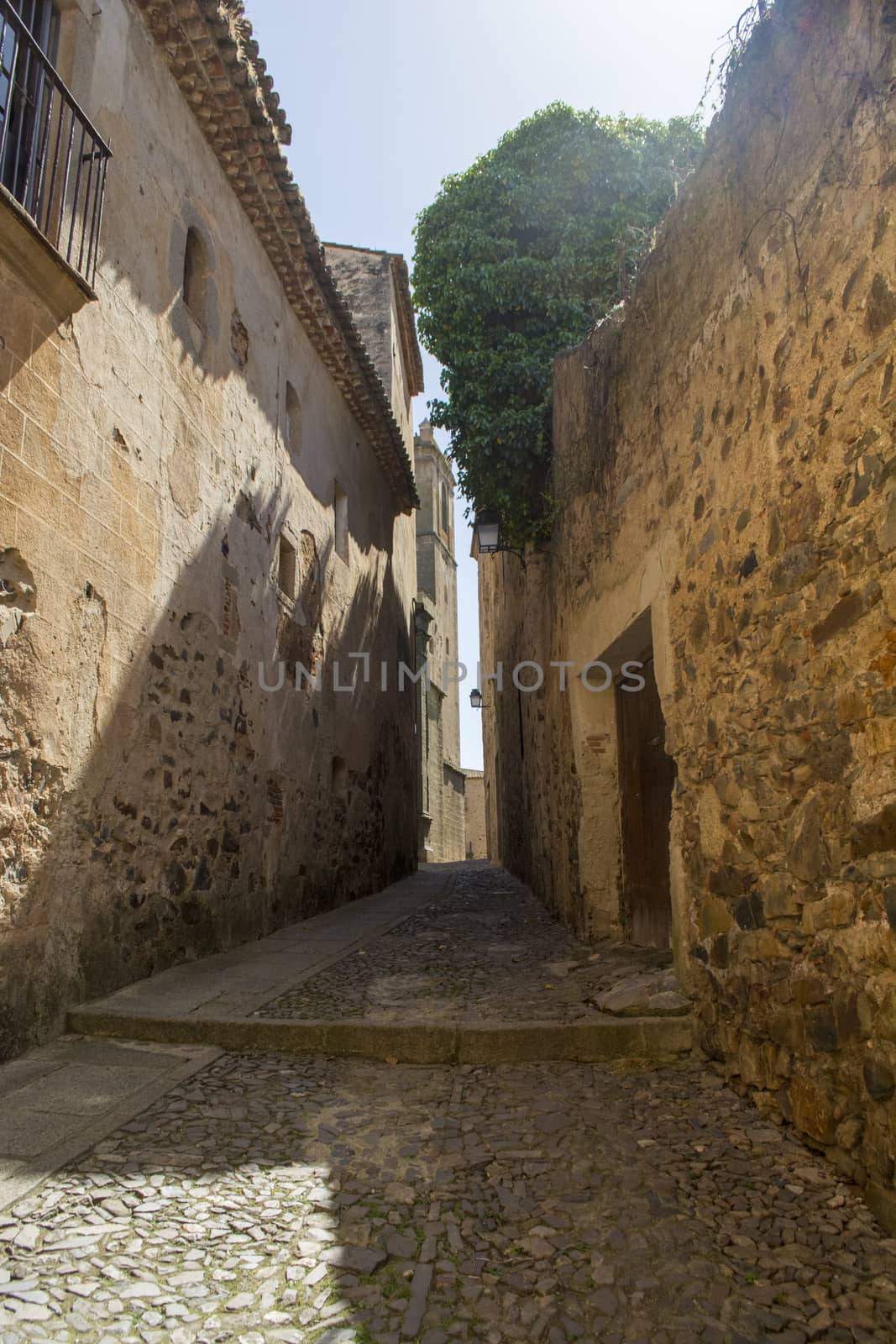 Caceres, Spain, April 2017: narrow streets and alleys of the historical old town of Caceres, Extremadura, Spain.