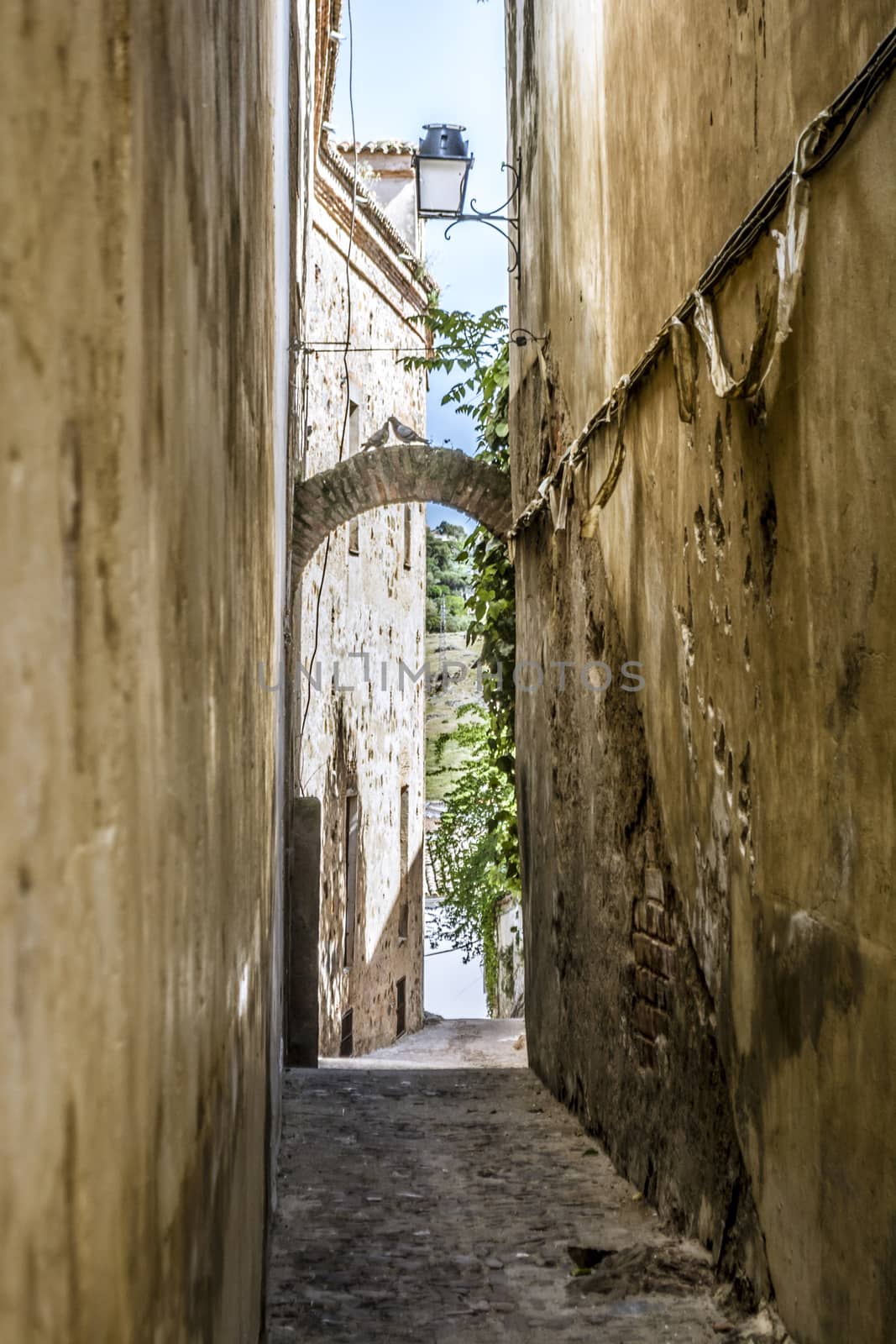 Caceres, Spain, April 2017: narrow streets and alleys of the historical old town of Caceres, Extremadura, Spain.