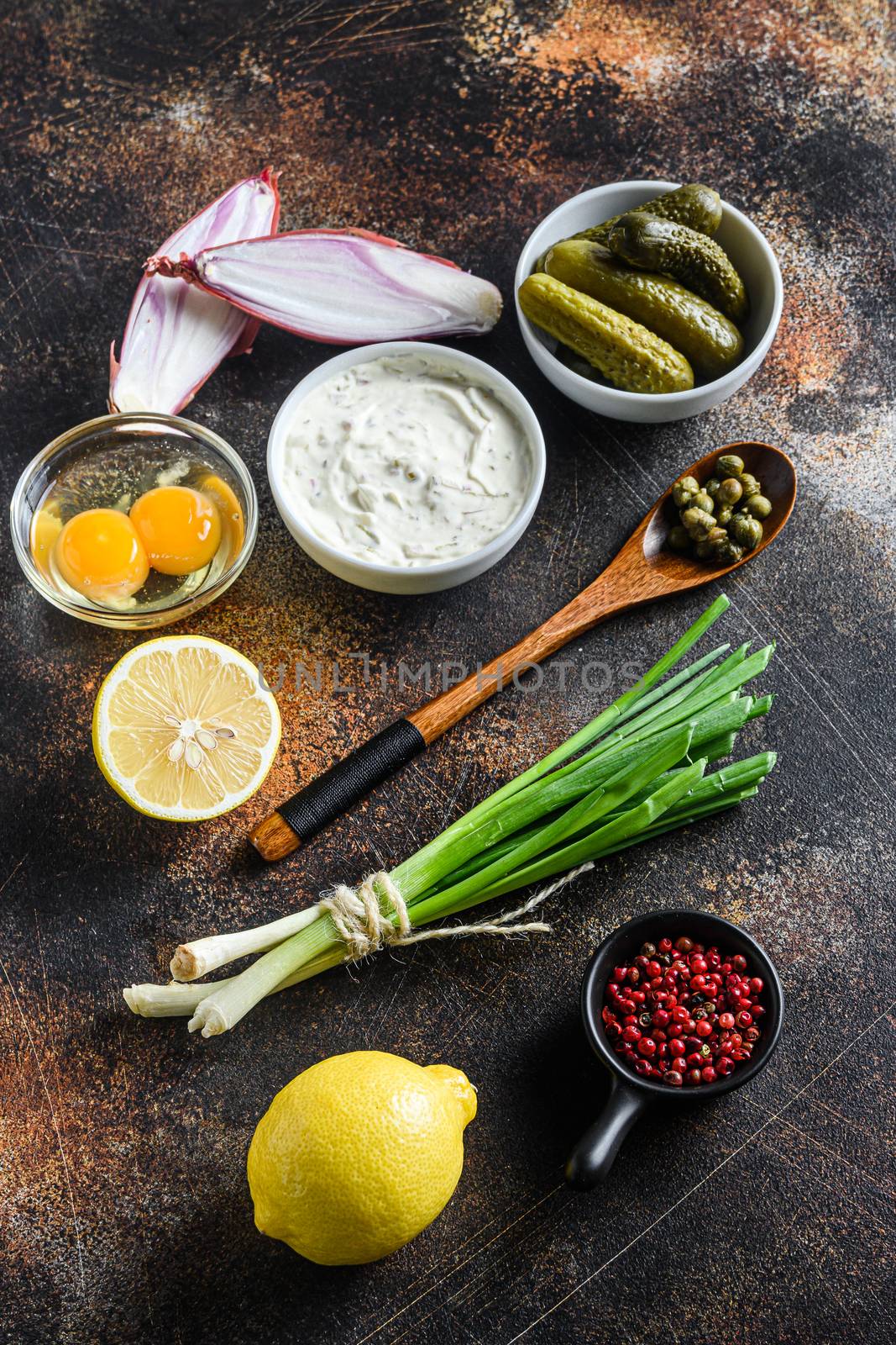 Ingredient tartar sauce organic mayonnaise, lemon,capers,parsley,dill,onion and various herbs. Over old rustic metall background Top view vertical by Ilianesolenyi