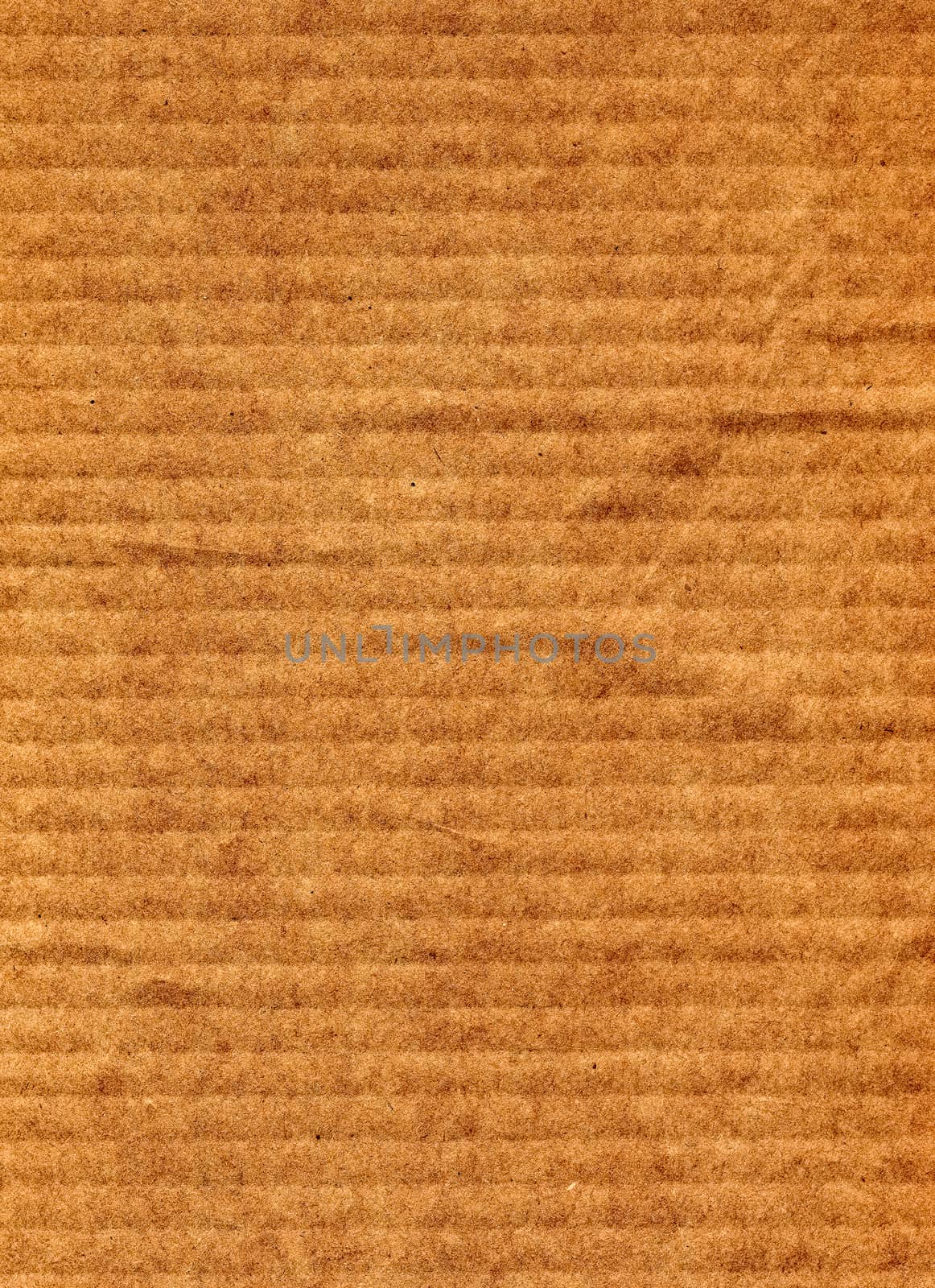 Brown corrugated cardboard background by claudiodivizia