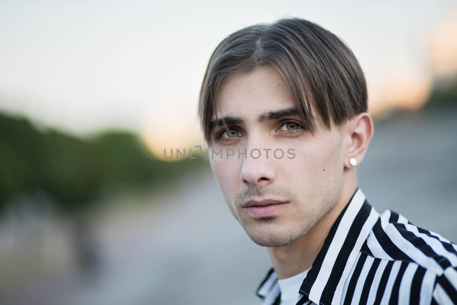 Portrait of a gay man - member of the LGBTQ community by day