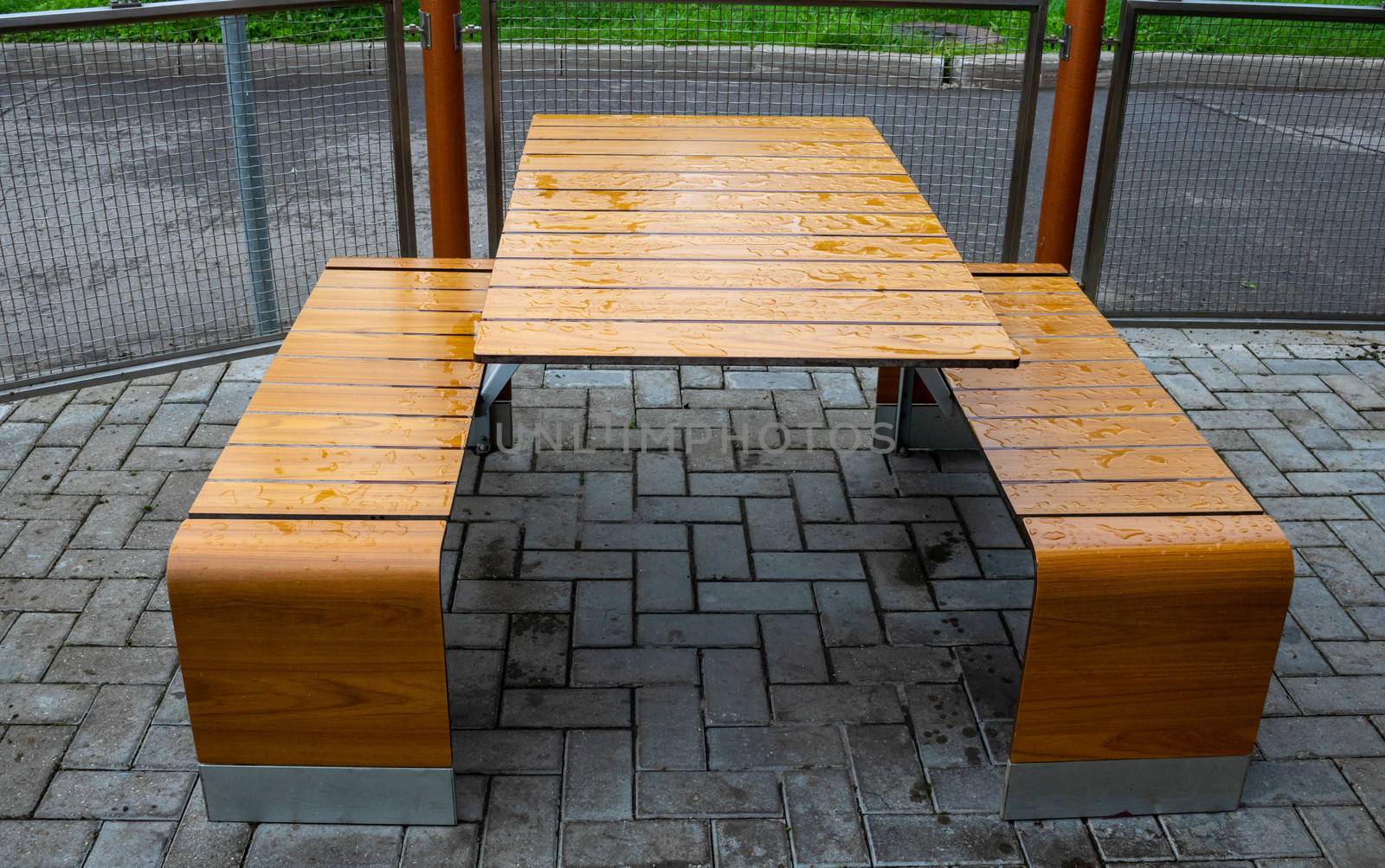 Light brown table, open roadside cafe on an autumn day.