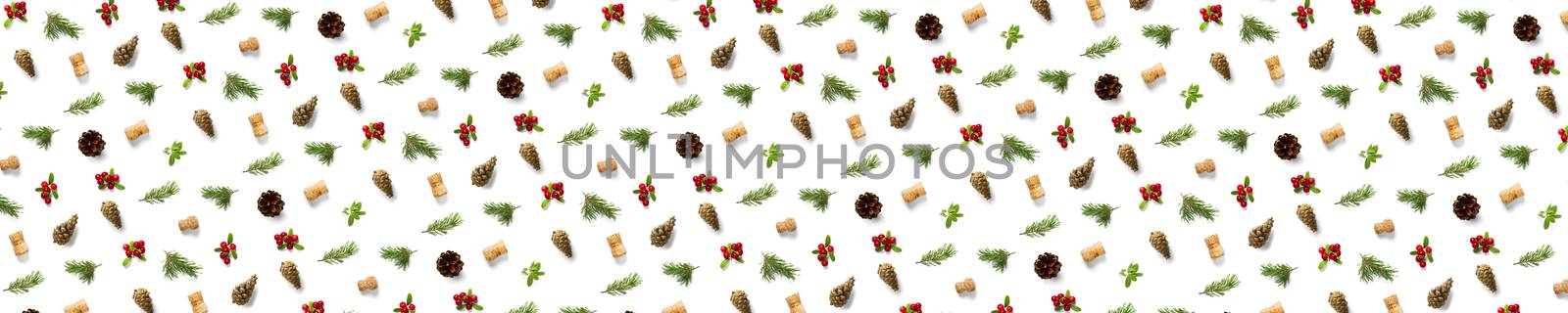 christmas background with pine cone, wine cork, pine twig and lingonberry. christmas background on white backdrop